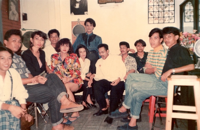 The Queer Indonesia Archive includes personal archives and those of institutions. This image is from Monica's personal archive, donated to the QIA. It depicts Monica with her friends in the salon c1990s/ QIA